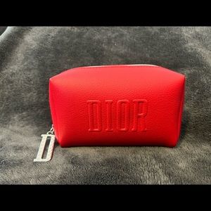 Travel size DIOR makeup bag with zipper closure